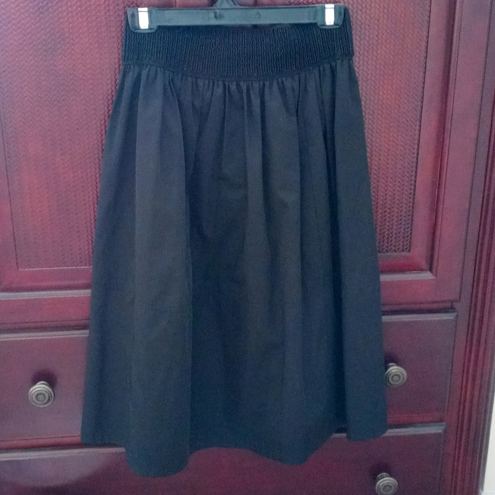IMPACT black raincoat skirt